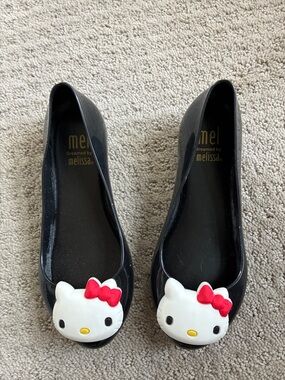 Melissa Black Jelly Flats with White Hello Kitty Faces and Red Bows